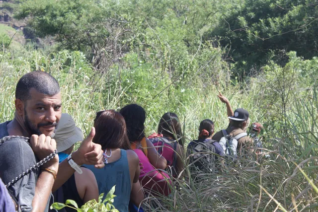 Smiling hikers on the trail to Peñón K59, El Salvador