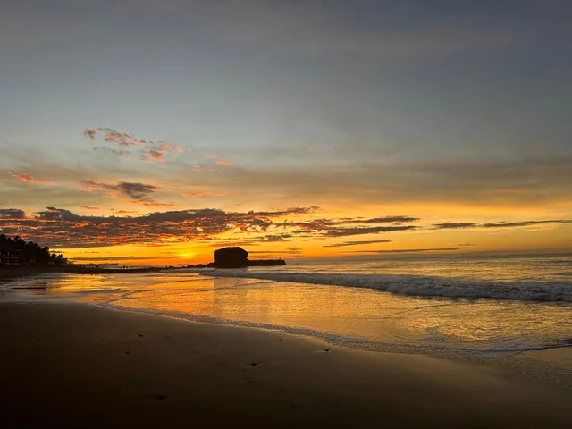 Golden sunset over the beach at El Tunco, Surf City, El Salvador