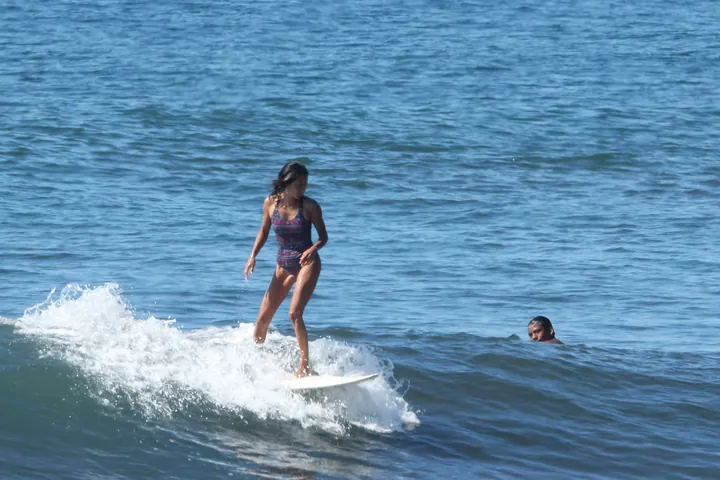 A surfer riding a clean wave at Mizata, El Salvador