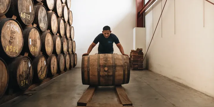 Rum barrels inside the Cihuatán distillery in El Paisnal